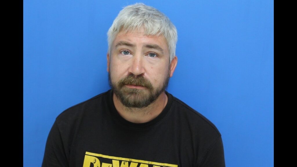 Booking photo from Catawba County Who’s In Jail roster. Simmons, Jonathan Tyler has not been convicted of the charges listed.