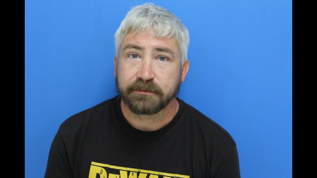 Booking photo from Catawba County Who’s In Jail roster. Simmons, Jonathan Tyler has not been convicted of the charges listed.